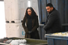Aurora Perrineau as Dani and Frank Harts as JT at a crimes scene in the “Ouroboros” episode of Prodigal Son - Season 2, Episode 8