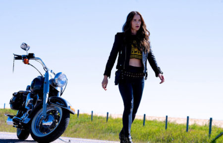 Melanie Scrofano with a motorcycle in the series finale of Wynonna Earp