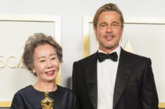 Yuh-Jung Youn poses backstage with the Oscar for Actress in a Supporting Role with Brad Pitt