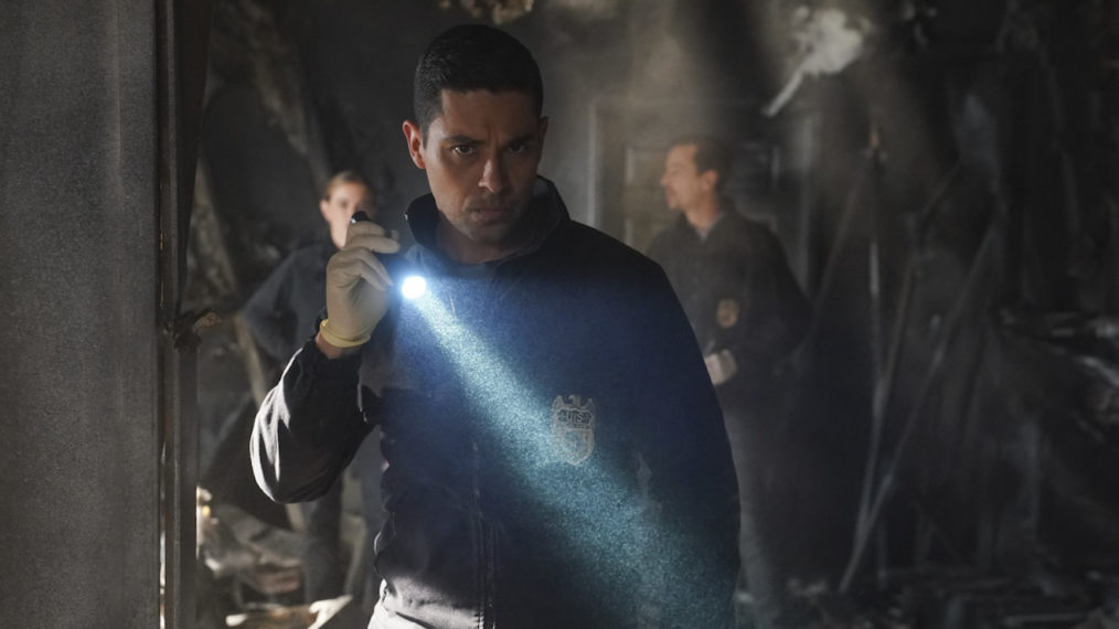 Wilmer Valderrama as NCIS Special Agent Nick Torres at a team crime scene in NCIS - Season 18 Episode 15