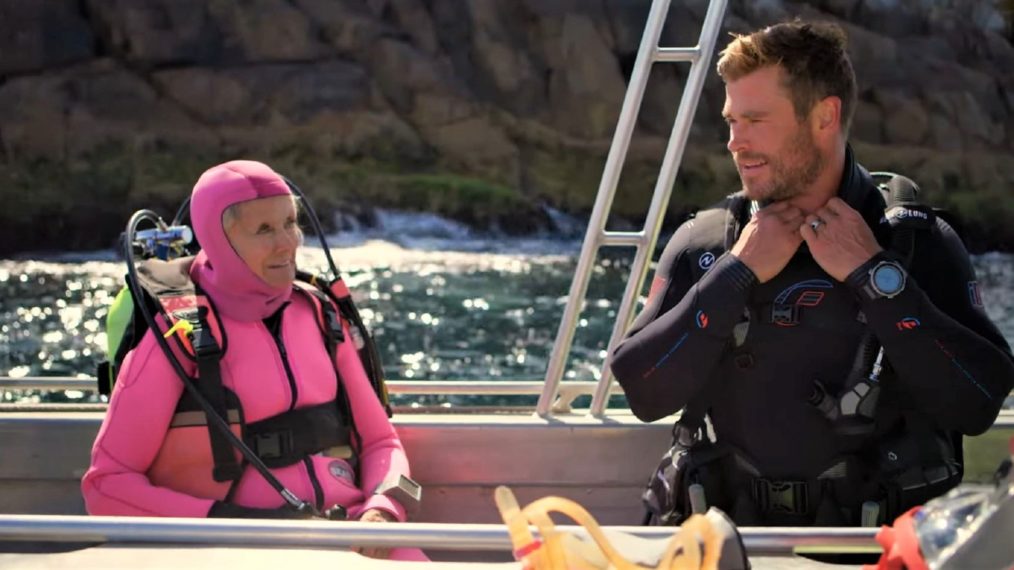Valerie Taylor (left) and Chris Hemsworth (right) in National Geographic's "Shark Beach" on Disney+