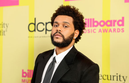 The Weeknd poses backstage for the 2021 Billboard Music Awards