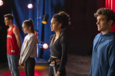 Matt Cornett, Olivia Rodrigo, Sofia Wylie, Joshua Bassett standing next to each other singing in High School Musical: The Musical: The Series - Season 3