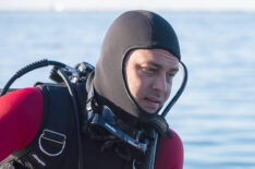 Taylor Kinney as Severide scuba diving in Chicago Fire