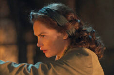 His Dark Materials - Ruth Wilson as Mrs Coulter holding hand over burning candle