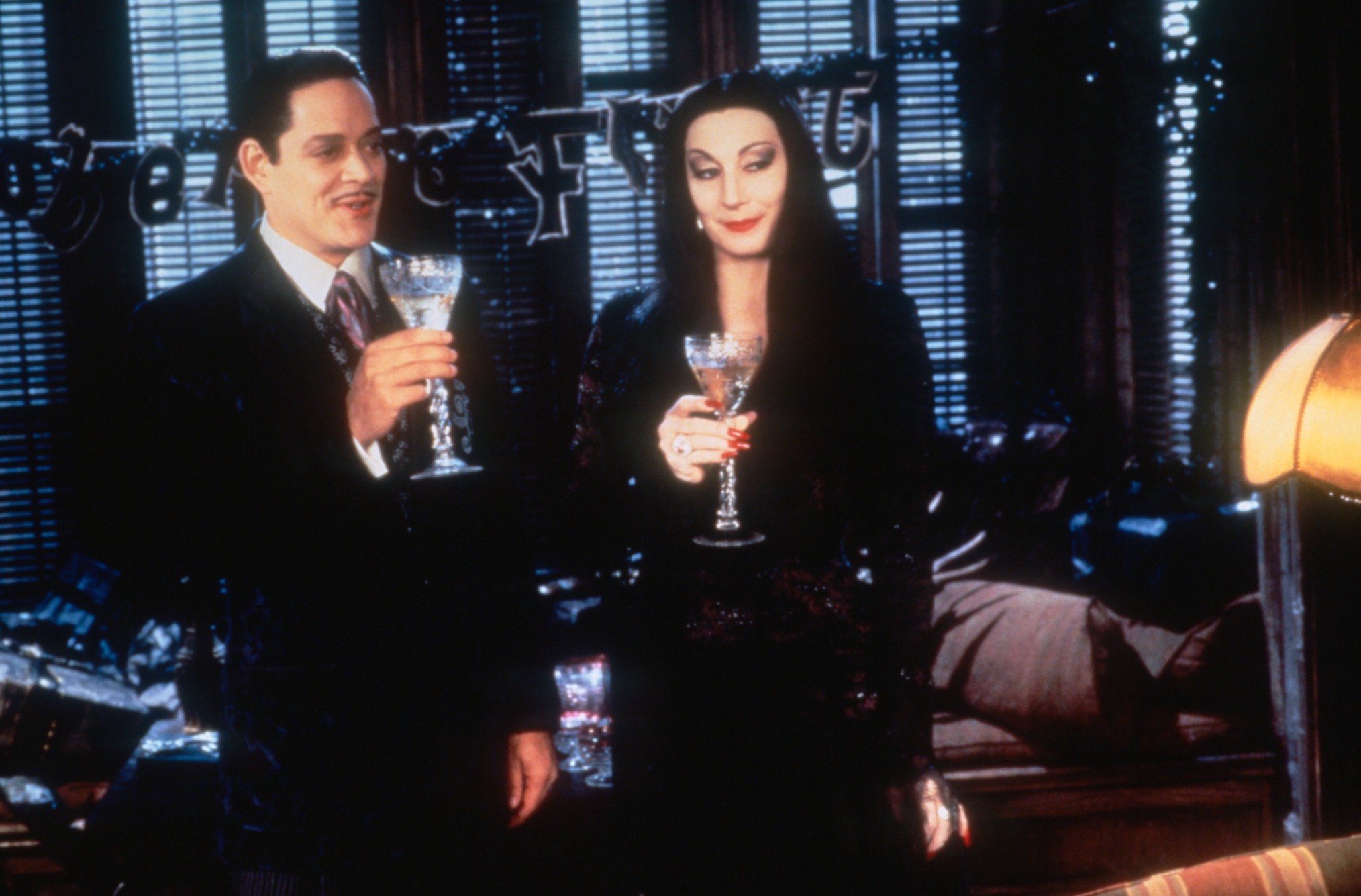 Raul Julia, Anjelica Huston in Addams Family Values
