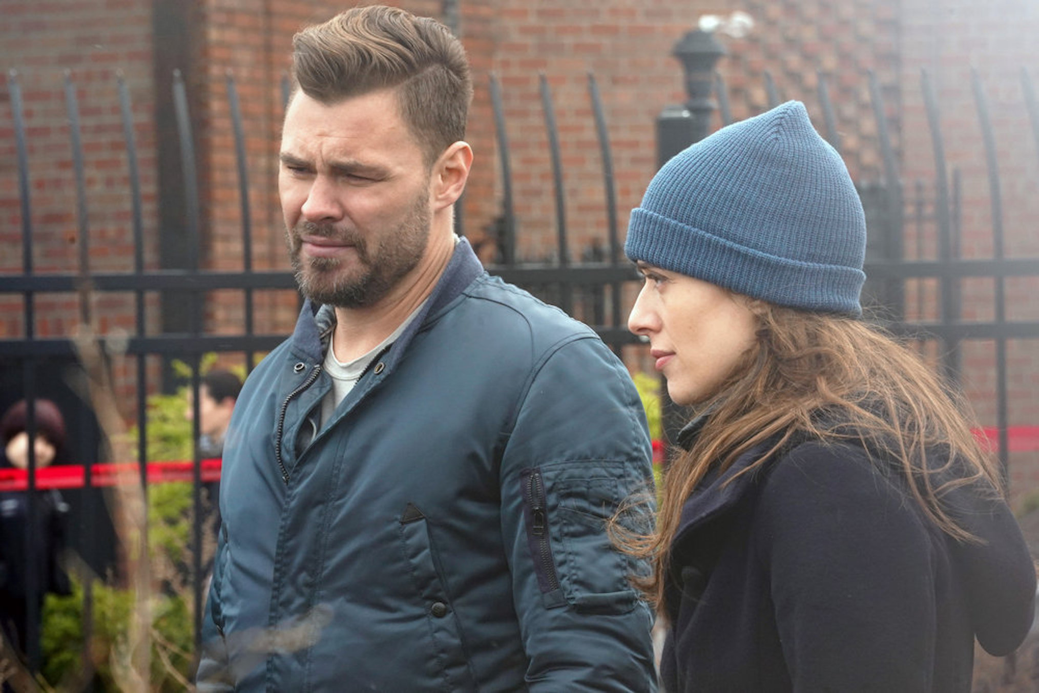 Patrick John Flueger as Ruzek, Marina Squerciati as Burgess in Chicago PD