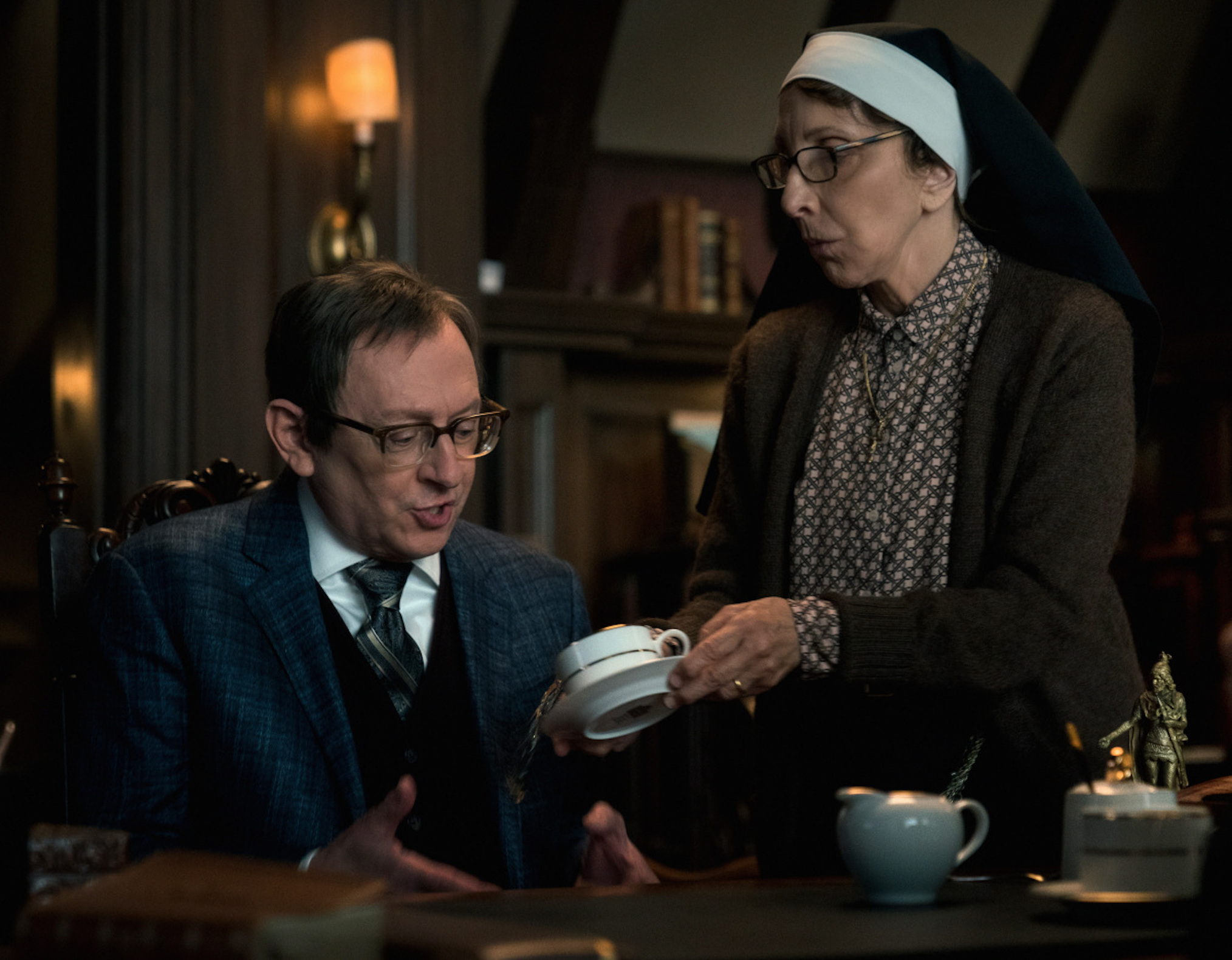 Michael Emerson as Leland, Andrea Martin as Sister Andrea in Evil