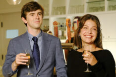 Freddie Highmore as Shaun, Paige Spara as Lea toasting champagne in The Good Doctor