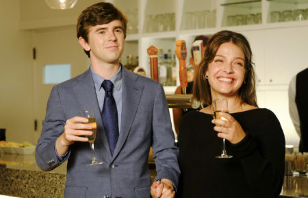 Freddie Highmore as Shaun, Paige Spara as Lea toasting champagne in The Good Doctor