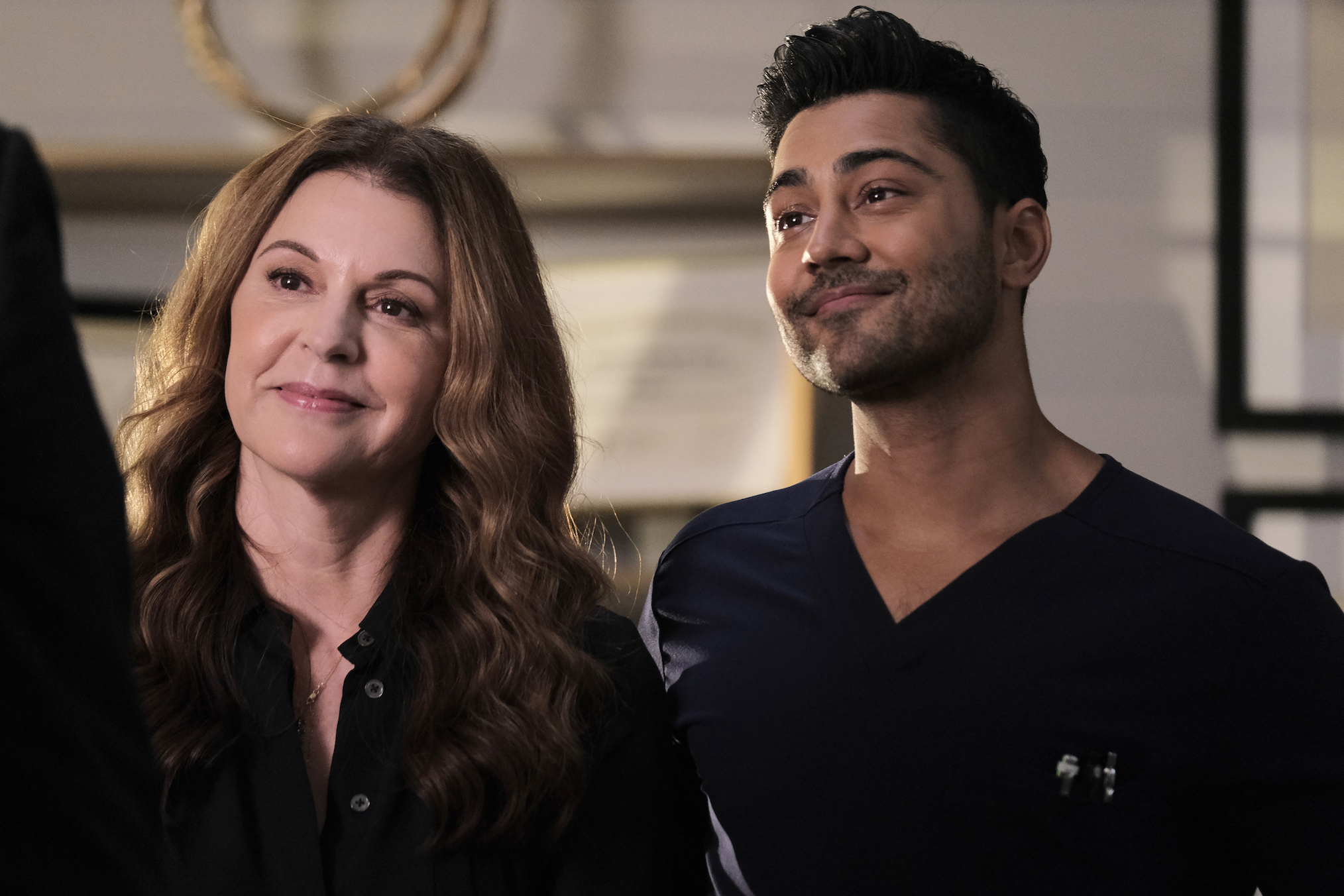 Jane Leeves as Kit, Manish Dayal as Devon in The Resident