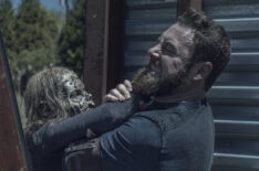 The Walking Dead - Season 11 Episode 5 - Ross Marquand as Aaron fighting a walker