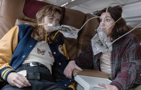 Ella Purnell and Sophie Nélisse on the plane in the Yellowjackets pilot