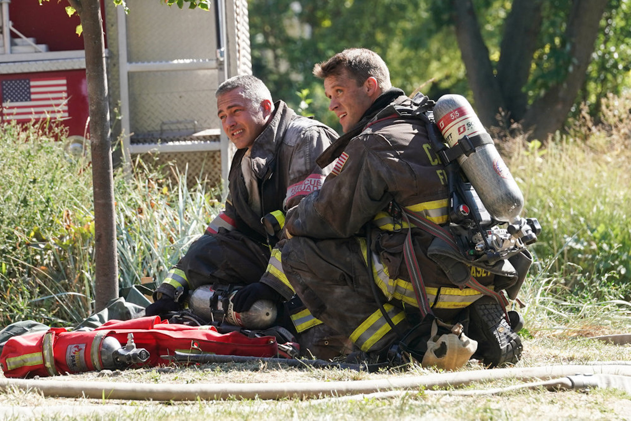 Taylor Kinney as Kelly Severide, Jesse Spencer as Matthew Casey in Chicago Fire