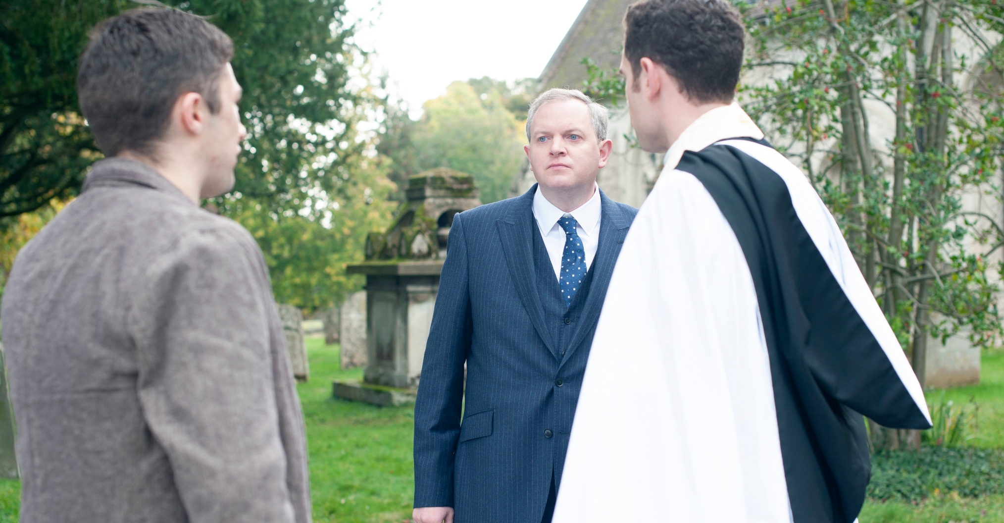 Tom Brittney as Will Davenport, Miles Jupp as Marcus Asper in Grantchester