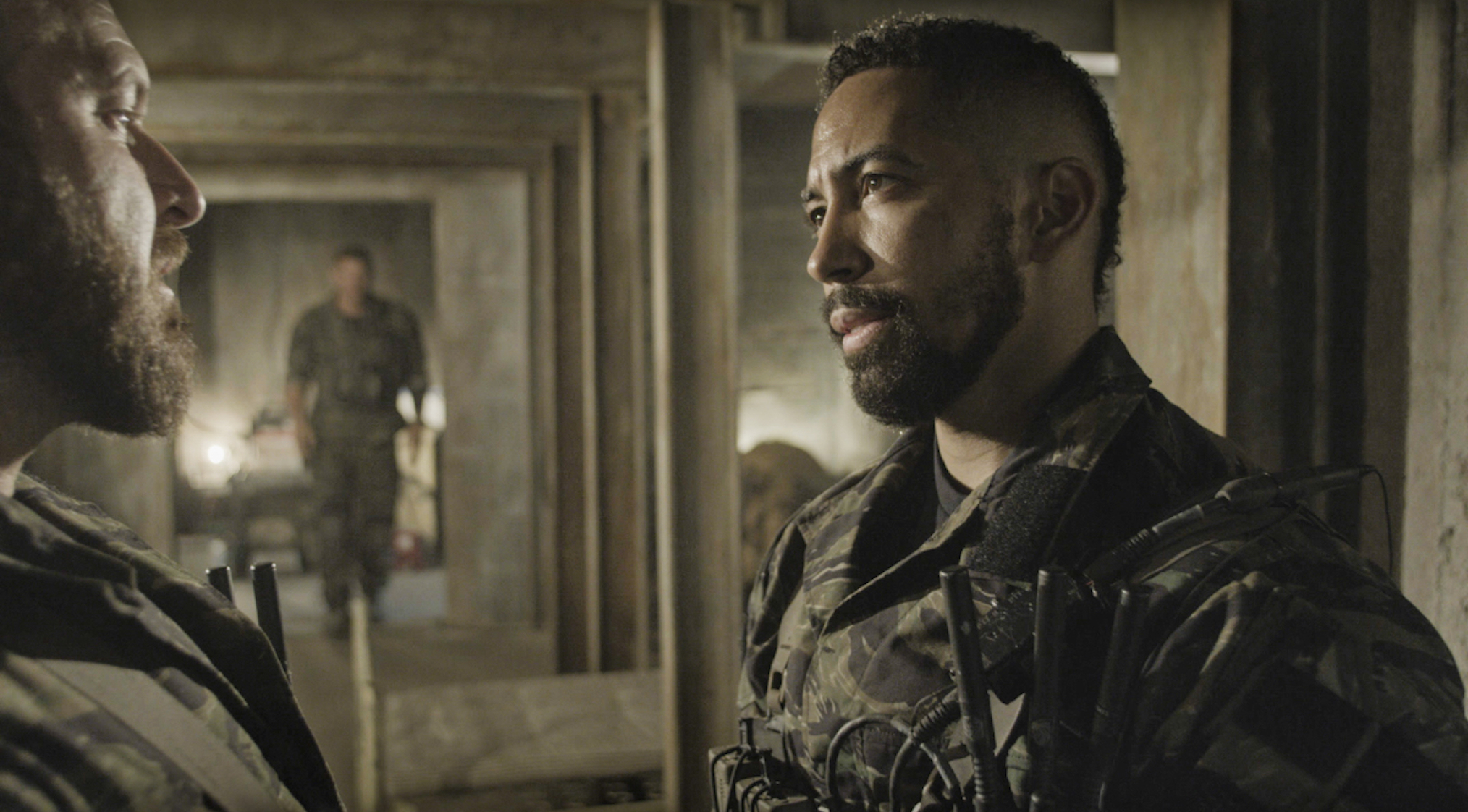 AJ Buckley as Sonny Quinn, Neil Brown Jr. as Ray Perry in SEAL Team