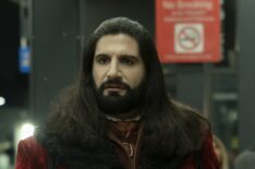 Kayvan Novak waiting for the train in What We Do in the Shadows