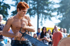 KJ Apa cutting wood on Riverdale - Season 6 premiere