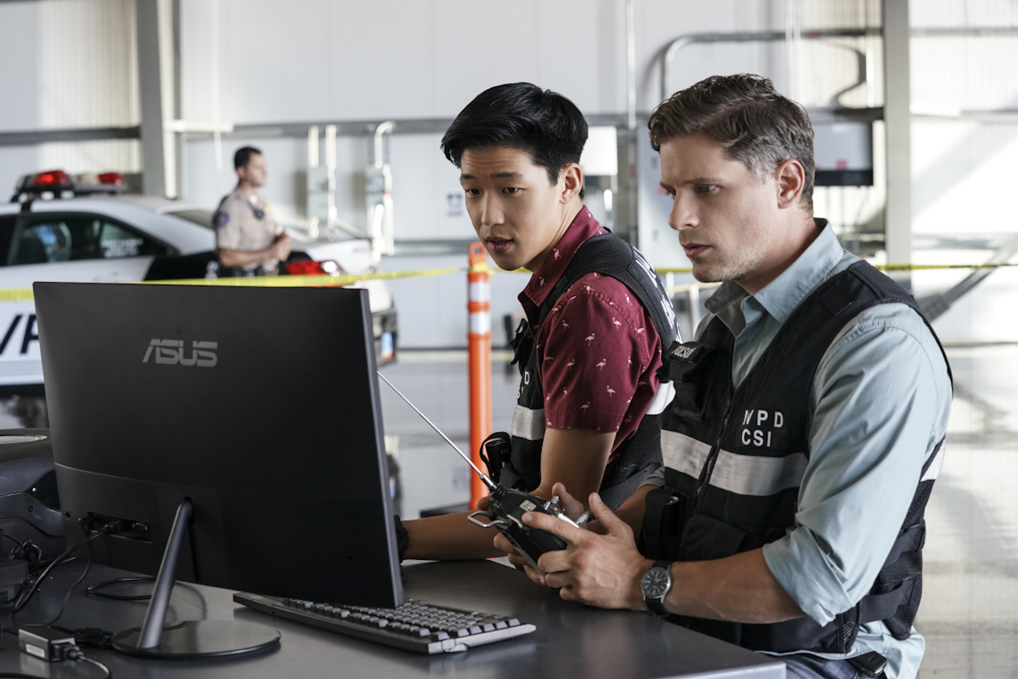 Jay Lee as Chris Park, Matt Lauria as Josh Folsom in CSI: Vegas