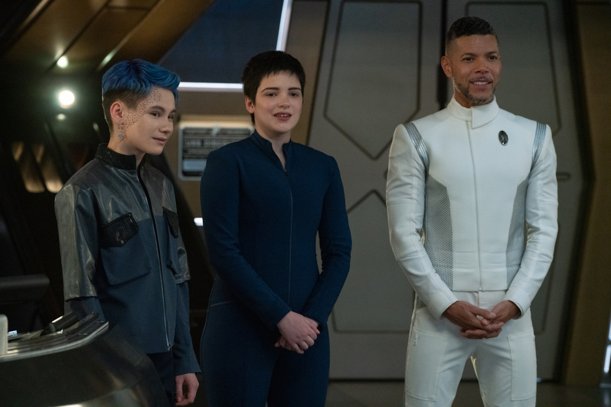 Pictured: Ian Alexander as Gray, Blu del Barrio as Adira, Wilson Cruz as Dr. Hugh Culber in Star Trek Discovery