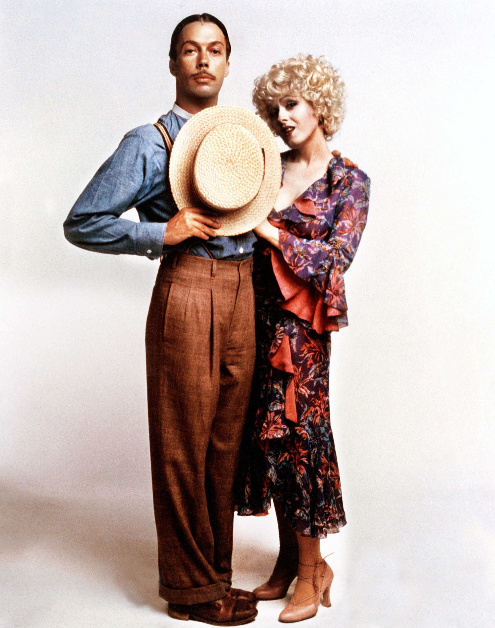 Tim Curry as Rooster, Bernadette Peters as Lily St. Regis in 'Annie' 1982
