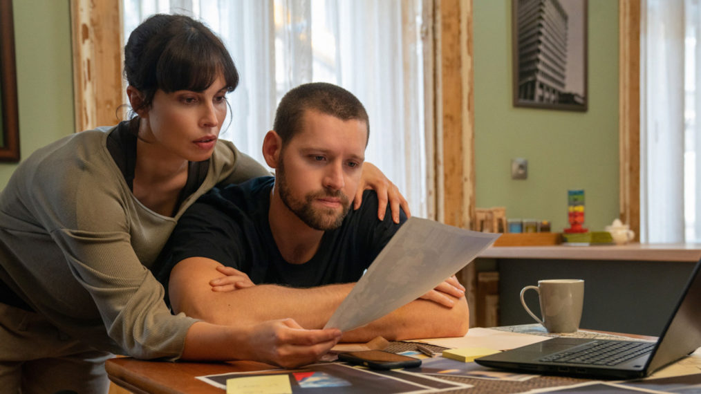 Heida Reed as Jamie Kellett, Luke Kleintank as Scott Forrester in FBI International