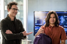 Tom Cavanagh as Harrison Wells, Carlos Valdes as Cisco Ramon in The Flash