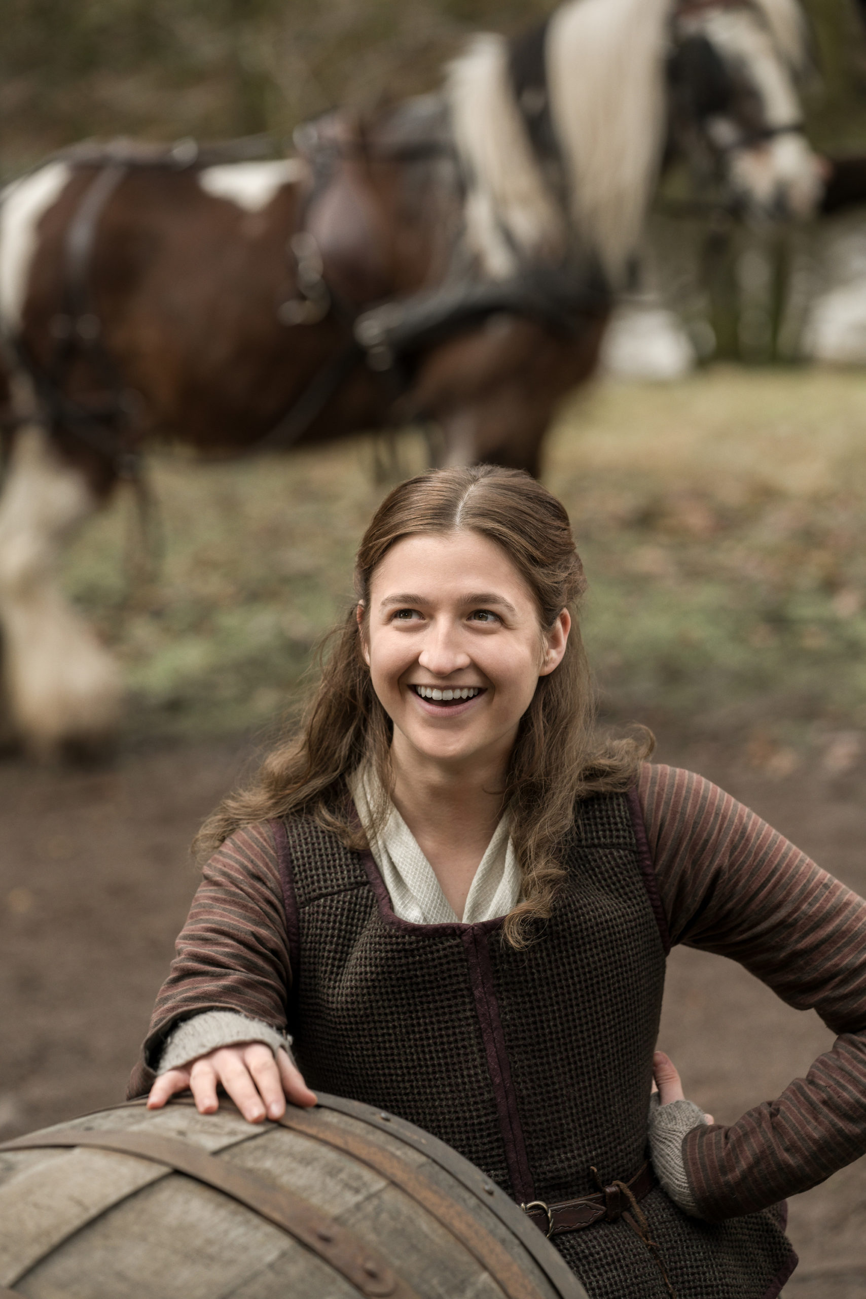 Outlander Season 6 - Caitlin O'Ryan has a little laugh between scenes in her Lizzy look.