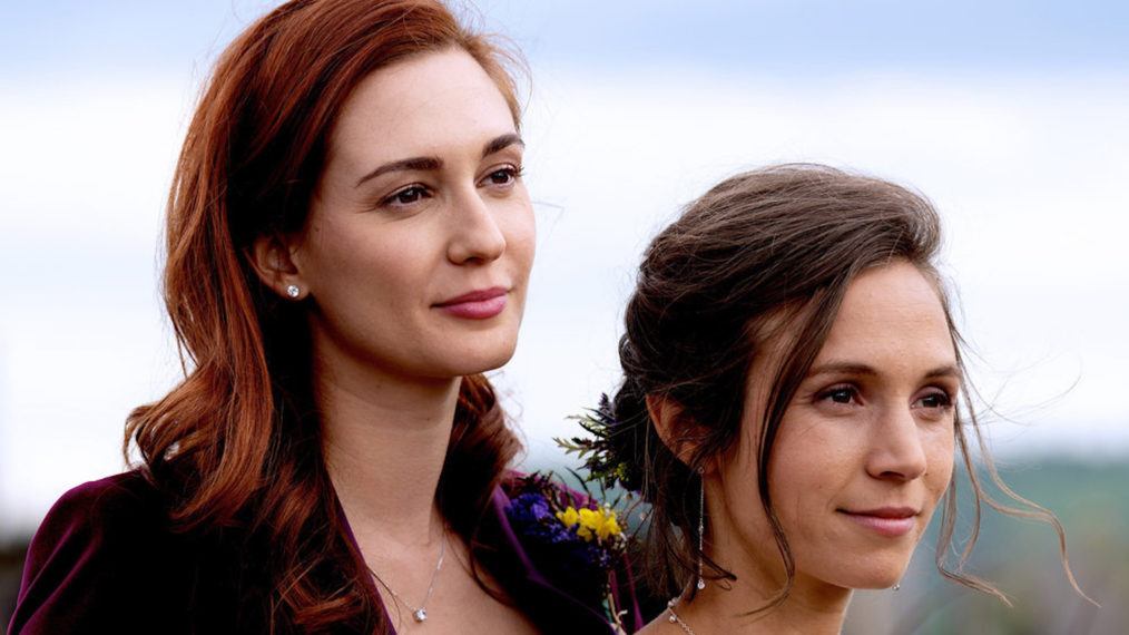 Katherine Barrell as Officer Nicole Haught, Dominique Provost-Chalkley as Waverly Earp in Wynonna Earp