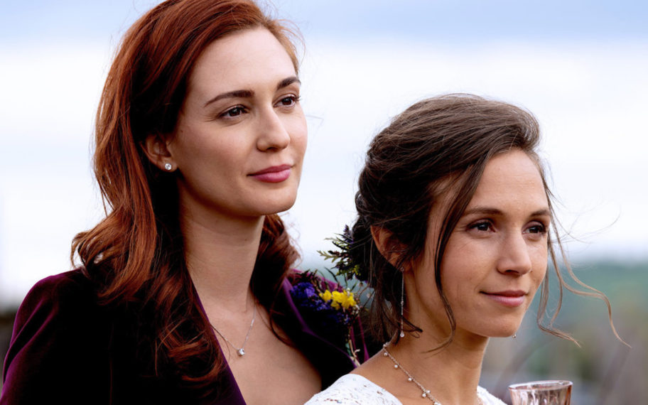 Katherine Barrell as Officer Nicole Haught, Dominique Provost-Chalkley as Waverly Earp in Wynonna Earp