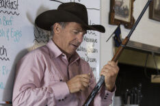 Kevin Costner as John loading his rifle in Yellowstone