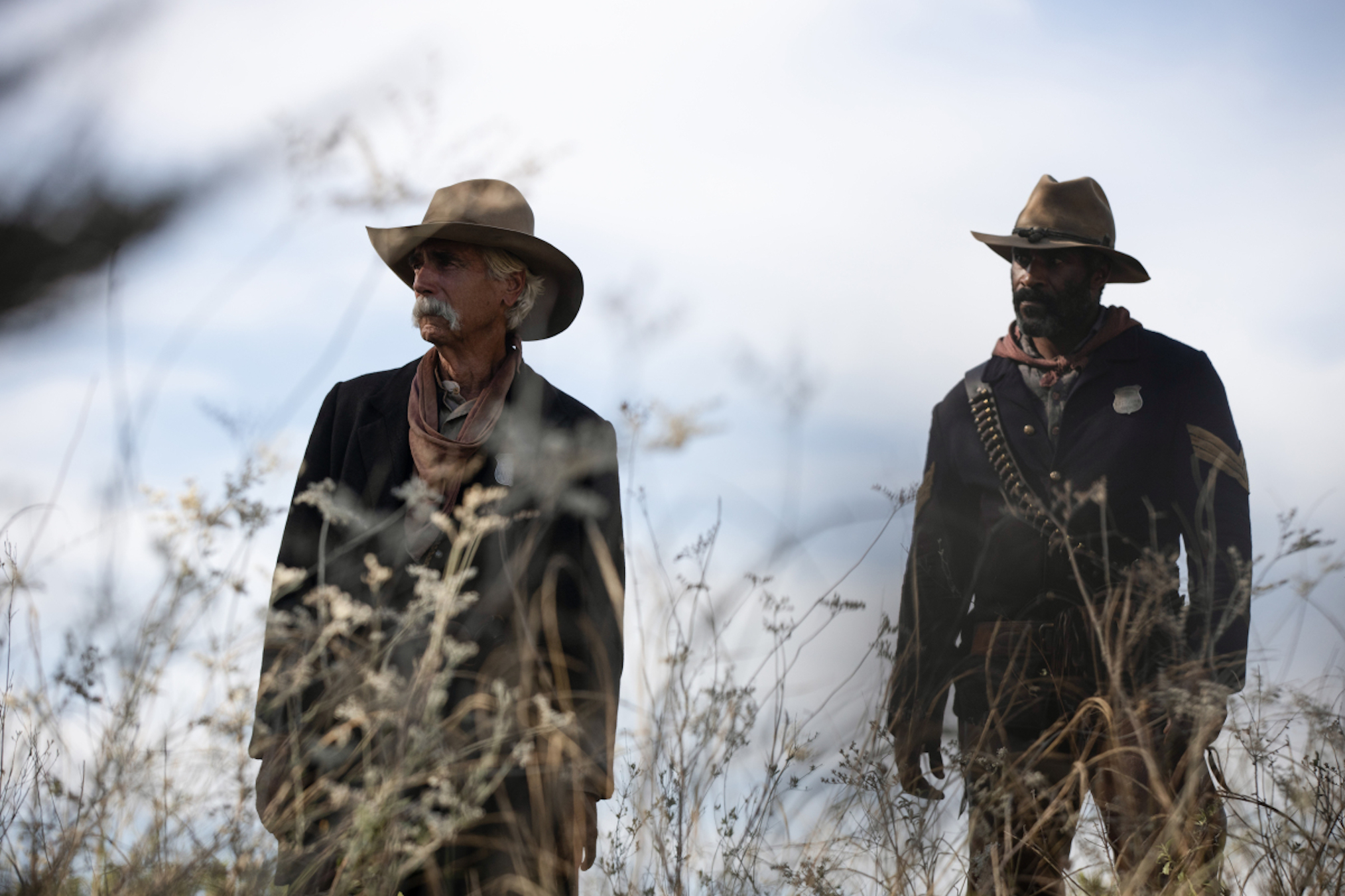 Sam Elliott as Shea, LaMonica Garrett as Thomas in 1883