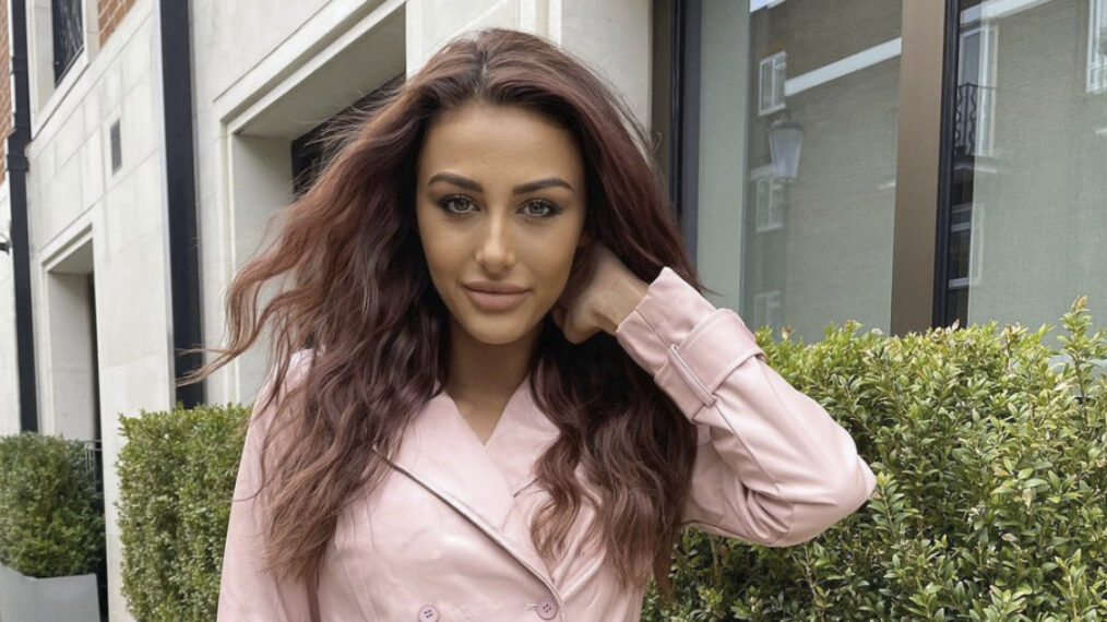 Too Hot To Handle's Chloe Veitch puts on a leggy display in a fuchsia pink dress