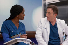 Skye P. Marshall as Dr. Lex Trulie, Jason Isaacs as Dr. Rob 'Griff' Griffith in Good Sam