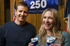 Will Estes and Vanessa Ray on Blue Bloods set with cupcakes