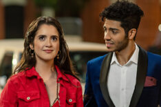 Laura Marano as Izzy and Mena Massoud as Prince Thomas in The Royal Treatment