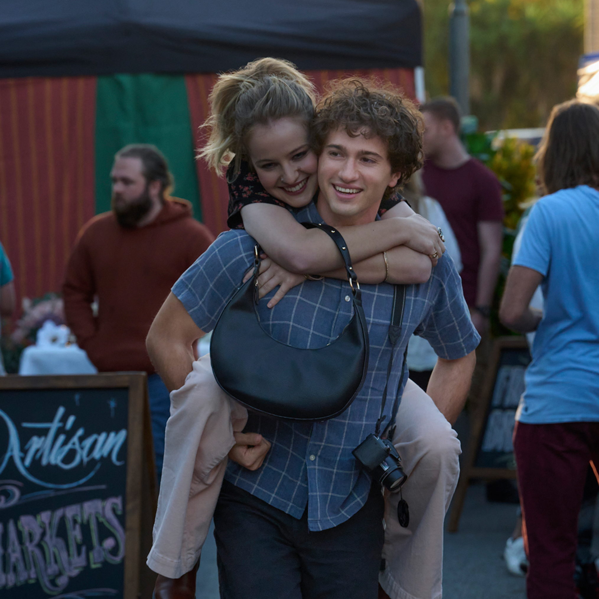 Asher Yasbincek as Julia and Alex Fitzalan as Seth Novak in The Wilds