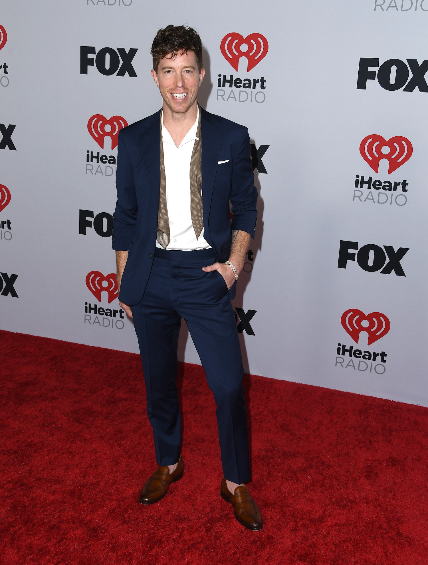 Professional snowboarder Shaun White walks the red carpet for the