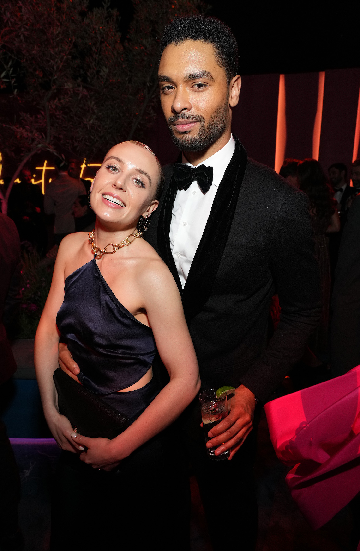 Emily Brown and Regé-Jean Page attend the 2022 Vanity Fair Oscar Party