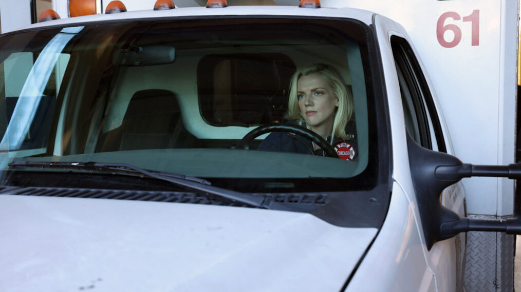 Kara Killmer as Sylvie Brett sitting in an ambulance in Chicago Fire - Season 10