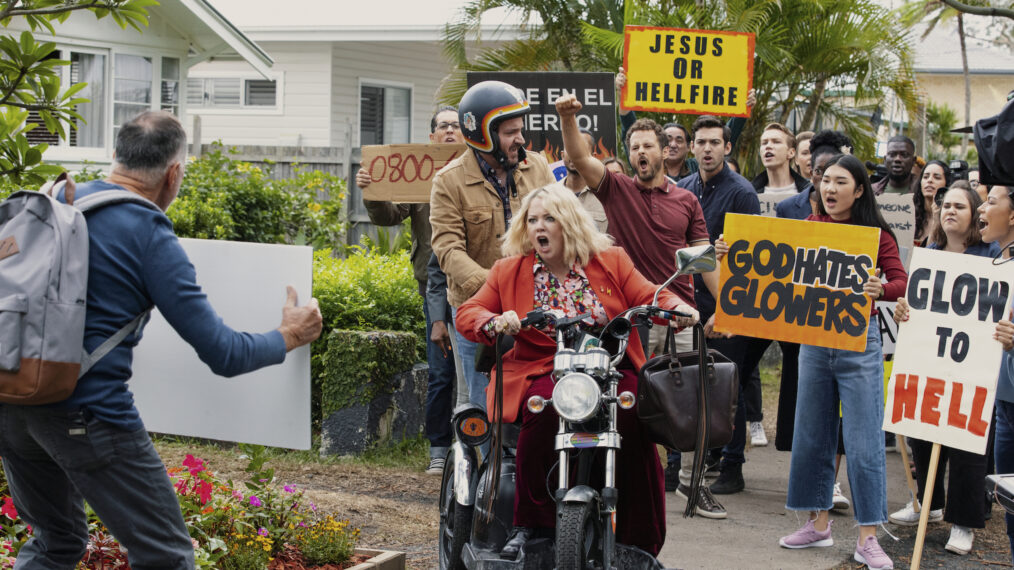 Ben Falcone as Clark Thompson, Melissa McCarthy as Amily Luck in God's Favorite Idiot