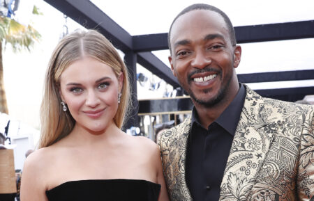 Kelsea Ballerini and Anthony Mackie attend the 64th Annual Grammy Awards