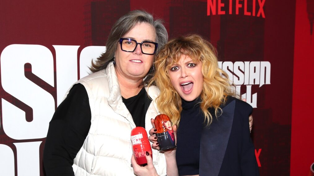 Rosie O'Donnell and Natasha Lyonne and holding Russian Dolls