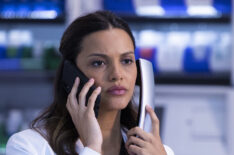 Jessica Lucas as Billie on two phones in The Resident