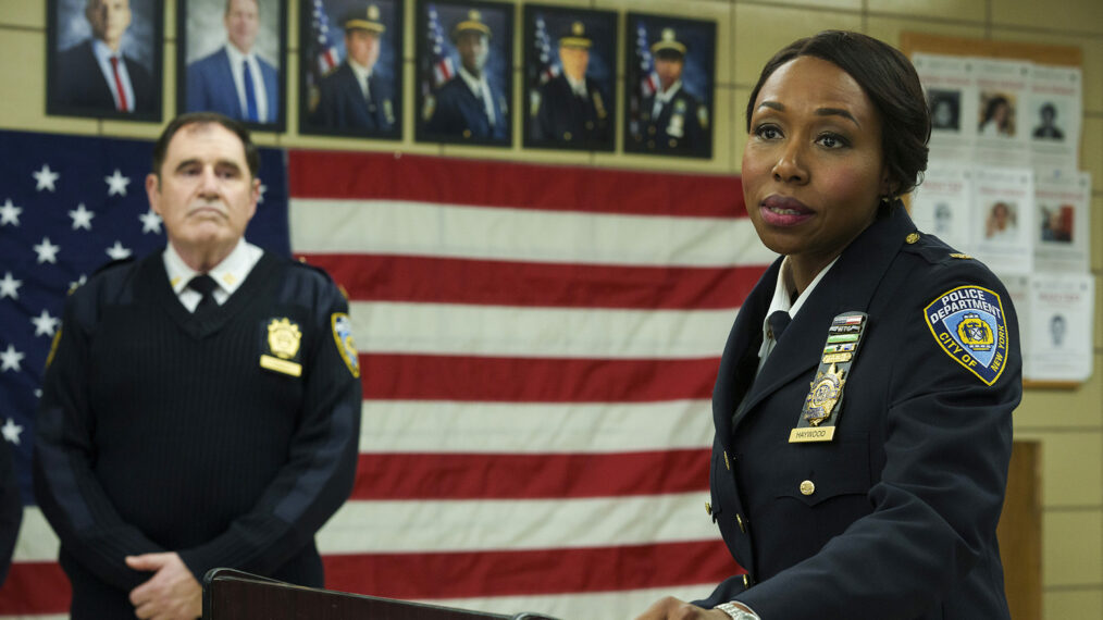 Richard Kind as Captain Stan Yenko and Amanda Warren as Regina Haywood in East New York