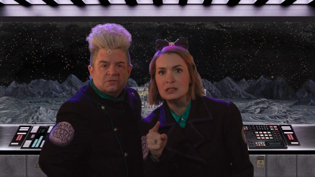 Patton Oswalt as Max and Felicia Day as Kinga Forrester in Mystery Science Theater 3000
