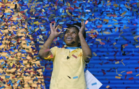 Zaila Avant-garde, 14, from Harvey, Louisiana is covered with confetti as she celebrates winning the finals of the 2021 Scripps National Spelling Bee at Disney World Thursday, July 8, 2021, in Lake Buena Vista, Fla. (AP Photo/John Raoux)