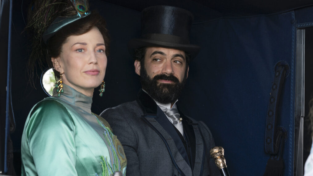 Carrie Coon as Bertha Russell and Morgan Spector as George Russell riding in a carriage in 'The Gilded Age' Season 1