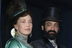 Carrie Coon as Bertha Russell and Morgan Spector as George Russell riding in a carriage in 'The Gilded Age' Season 1