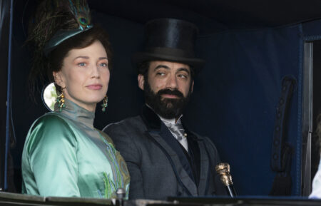 Carrie Coon as Bertha Russell and Morgan Spector as George Russell riding in a carriage in 'The Gilded Age' Season 1